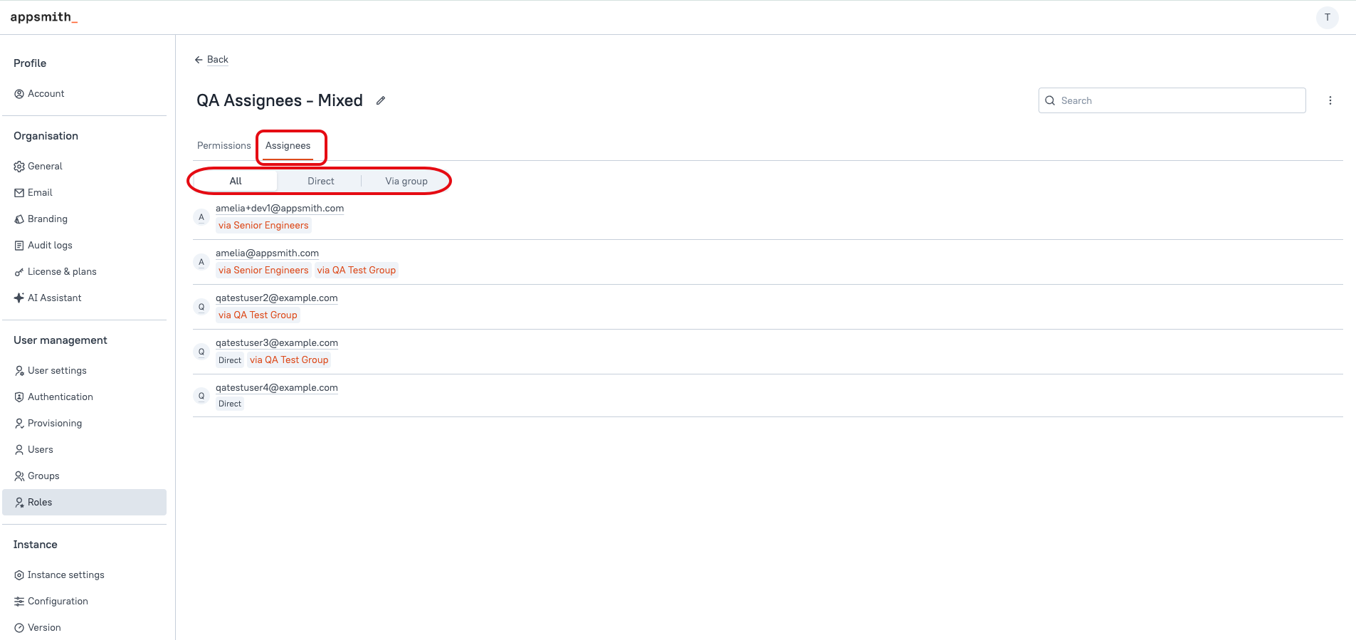 Assignees tab on a role showing users with Direct and via group sources